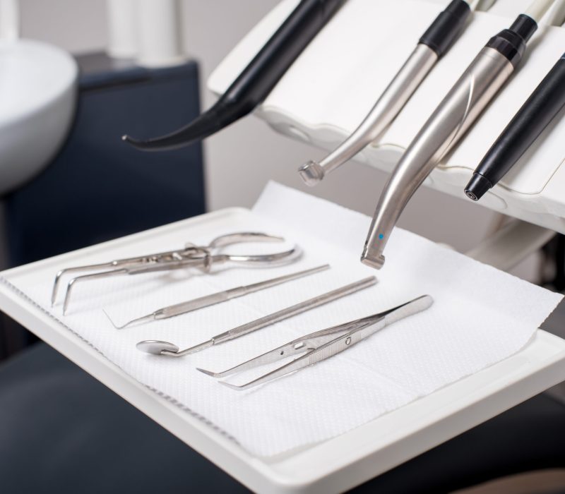 Different professional dental instruments in a dentist's office